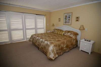 View of the Master Bedroom with Shutters Closed